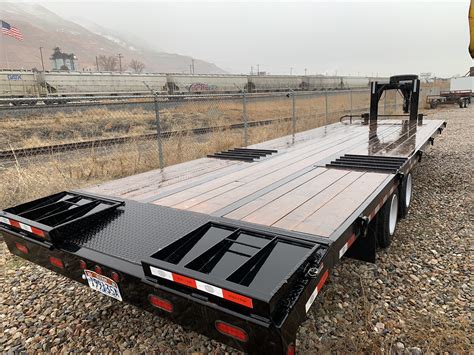 skid steer on deckover gooseneck|gooseneck trailers for sale.